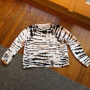 White and black sweater